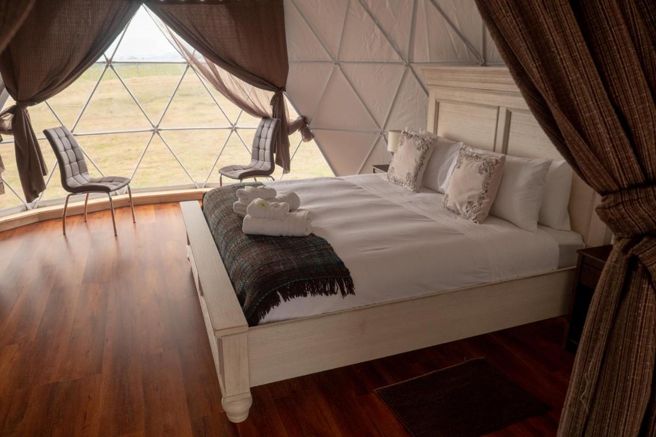 Garden Domes Villa ปวยร์โตนาตาเลส ภายนอก รูปภาพ