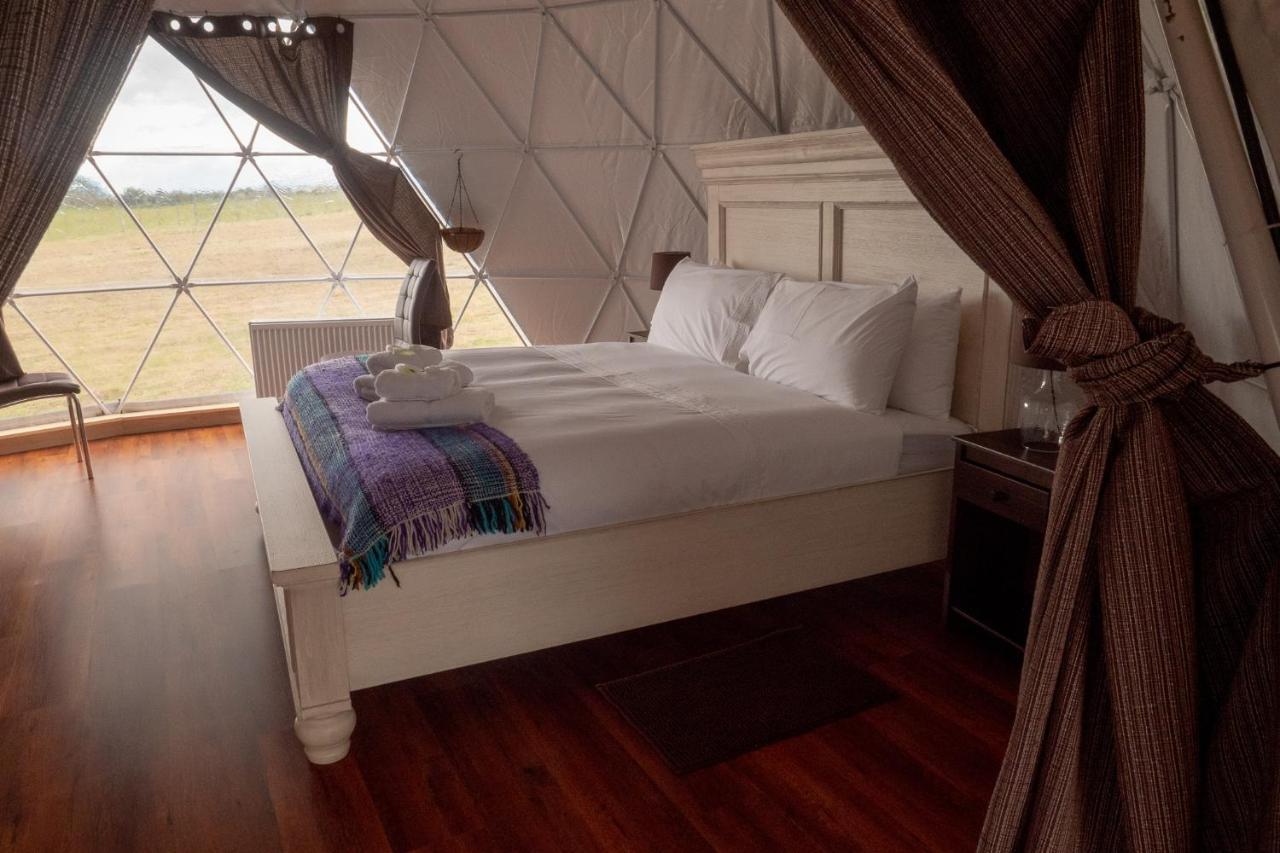 Garden Domes Villa ปวยร์โตนาตาเลส ภายนอก รูปภาพ