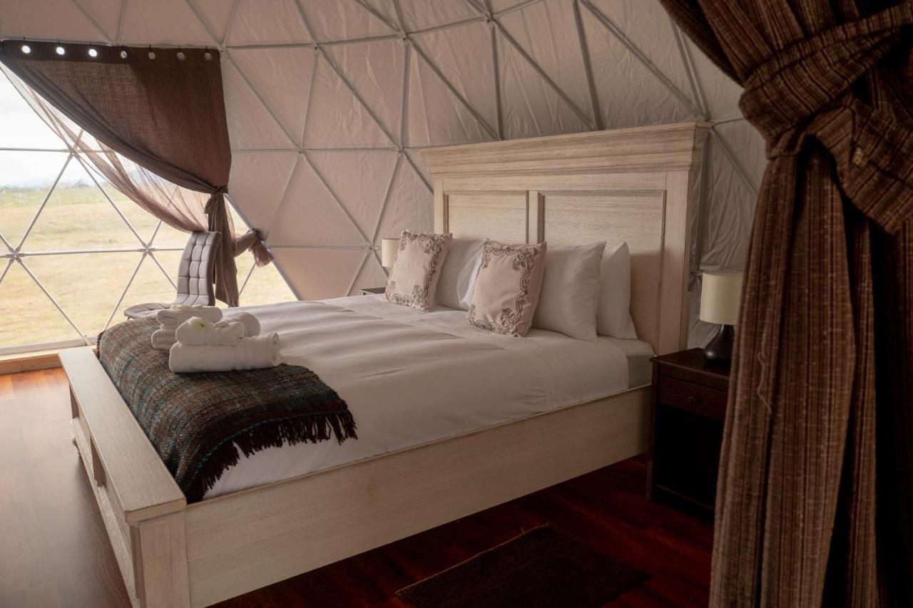 Garden Domes Villa ปวยร์โตนาตาเลส ภายนอก รูปภาพ